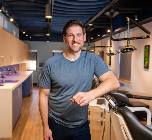 Dr. Dave Pechersky, inventor and founder of Movemints, standing in his orthodontic office