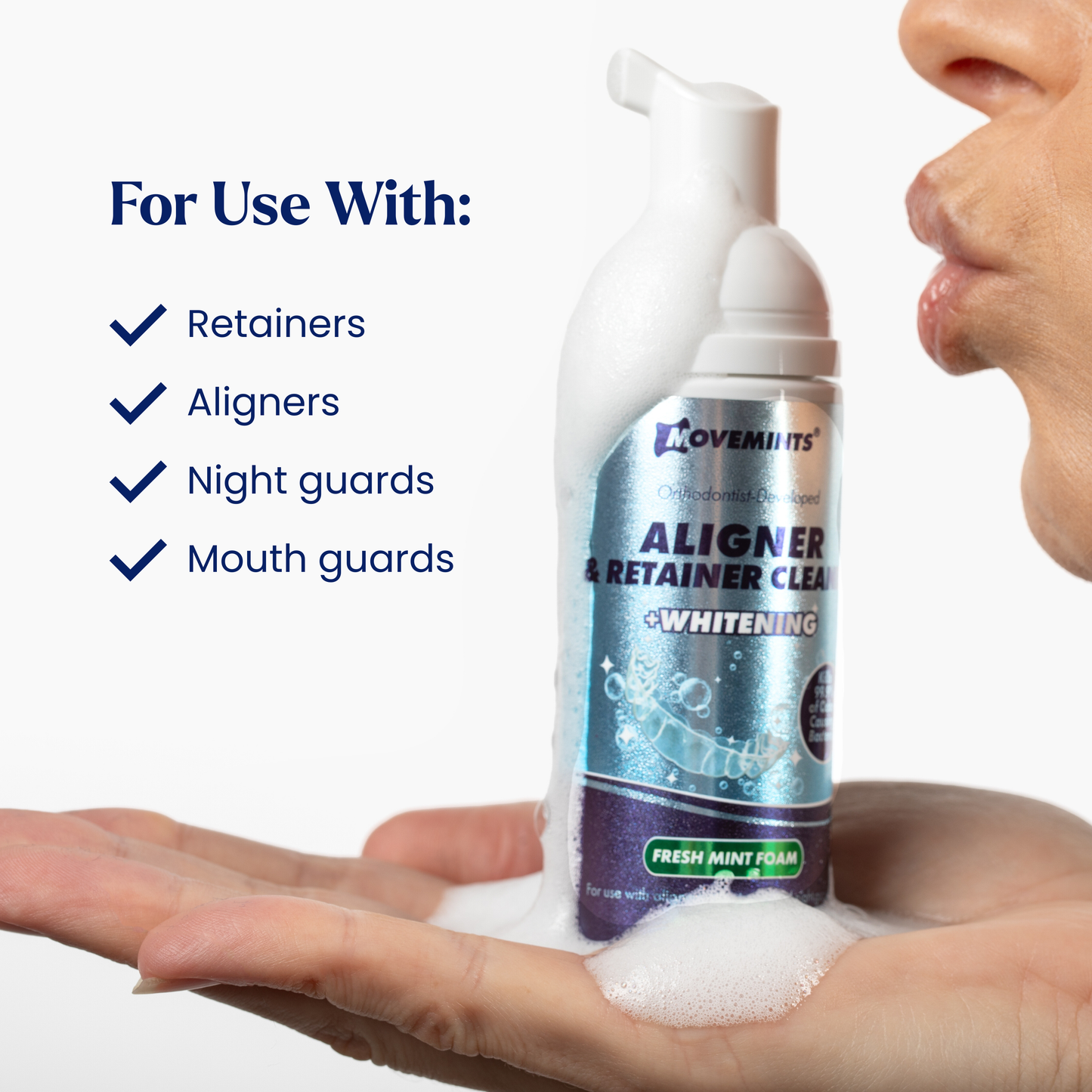 Model kissing a bottle of Movemints Aligner & Retainer Cleaning Foam + Whitening with list of approved dental devices