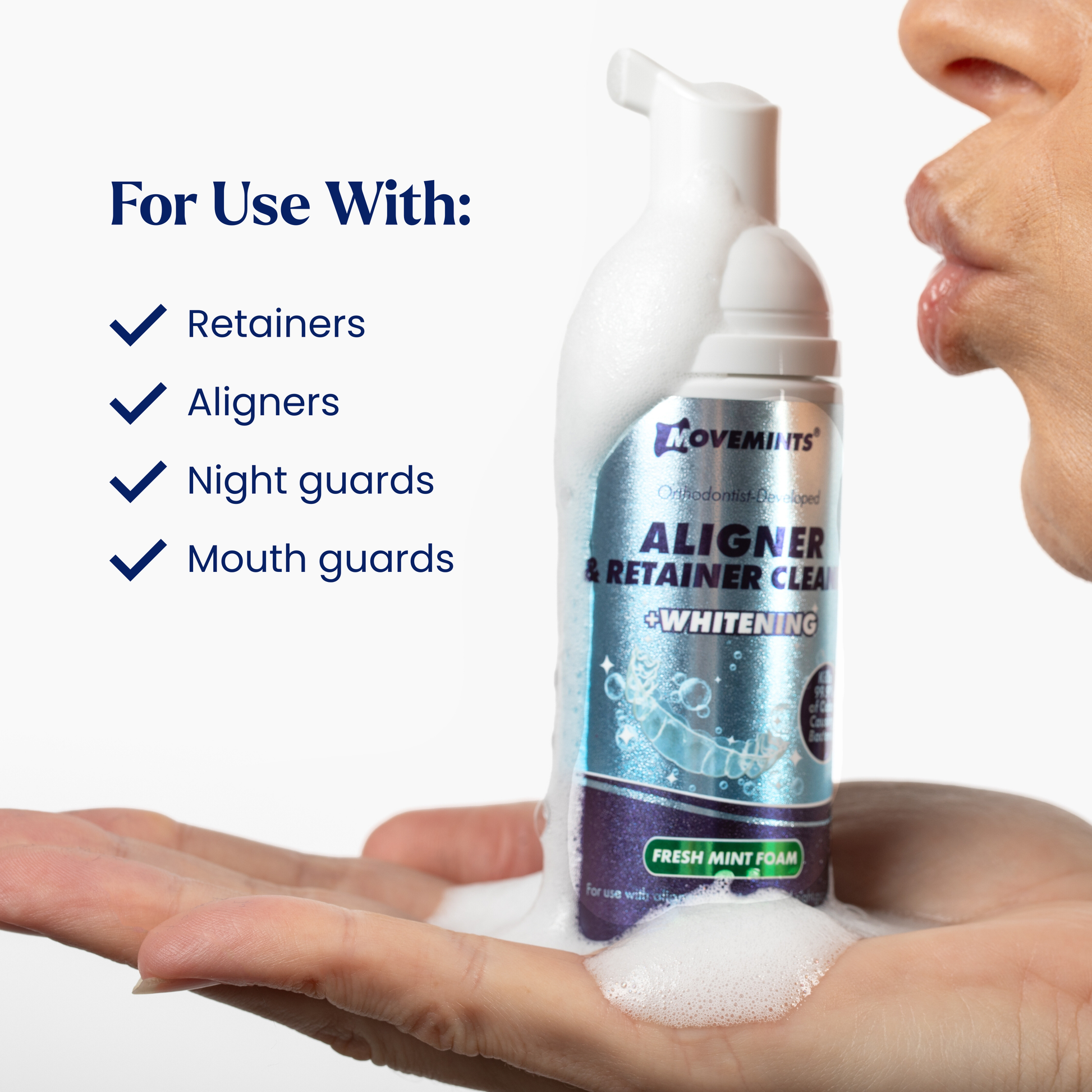 Model kissing a bottle of Movemints Aligner & Retainer Cleaning Foam + Whitening with list of approved dental devices